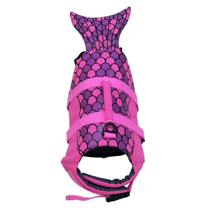 Pink and purple fish-shaped dog life jacket on a white background