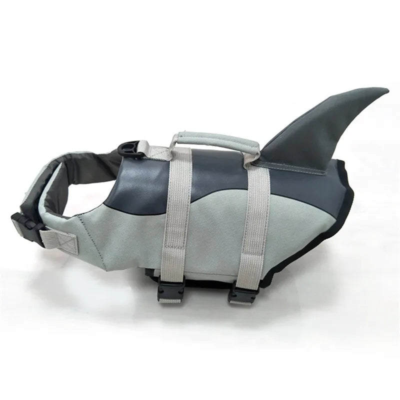 Dog life jacket with shark fin design on a white background